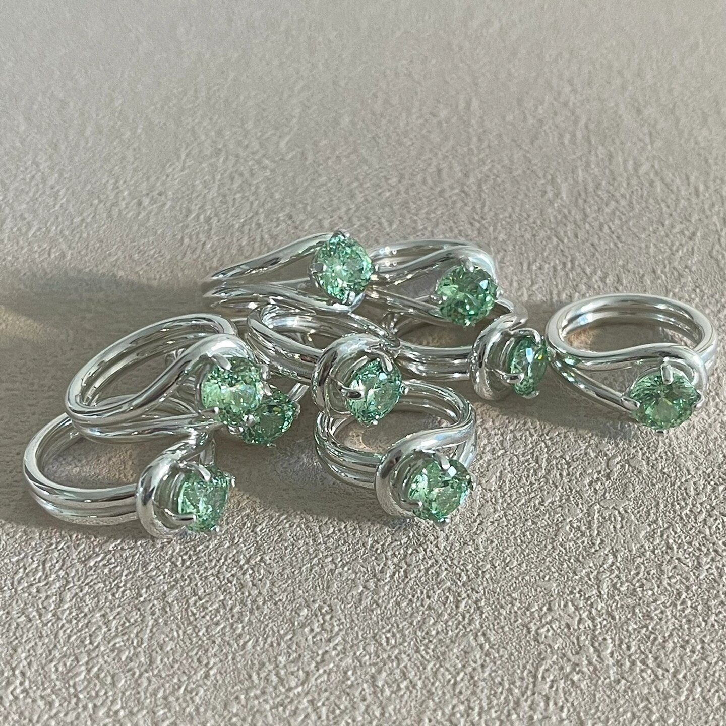 Green Knot Twisted Silver Ring